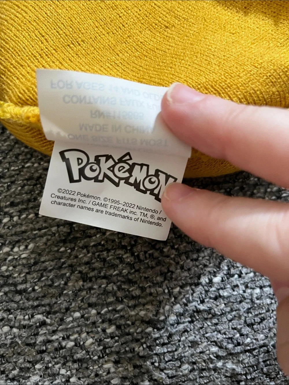 Pokemon Winking Eevee with Ears Beanie Hat with Pom-Pom Tassels
